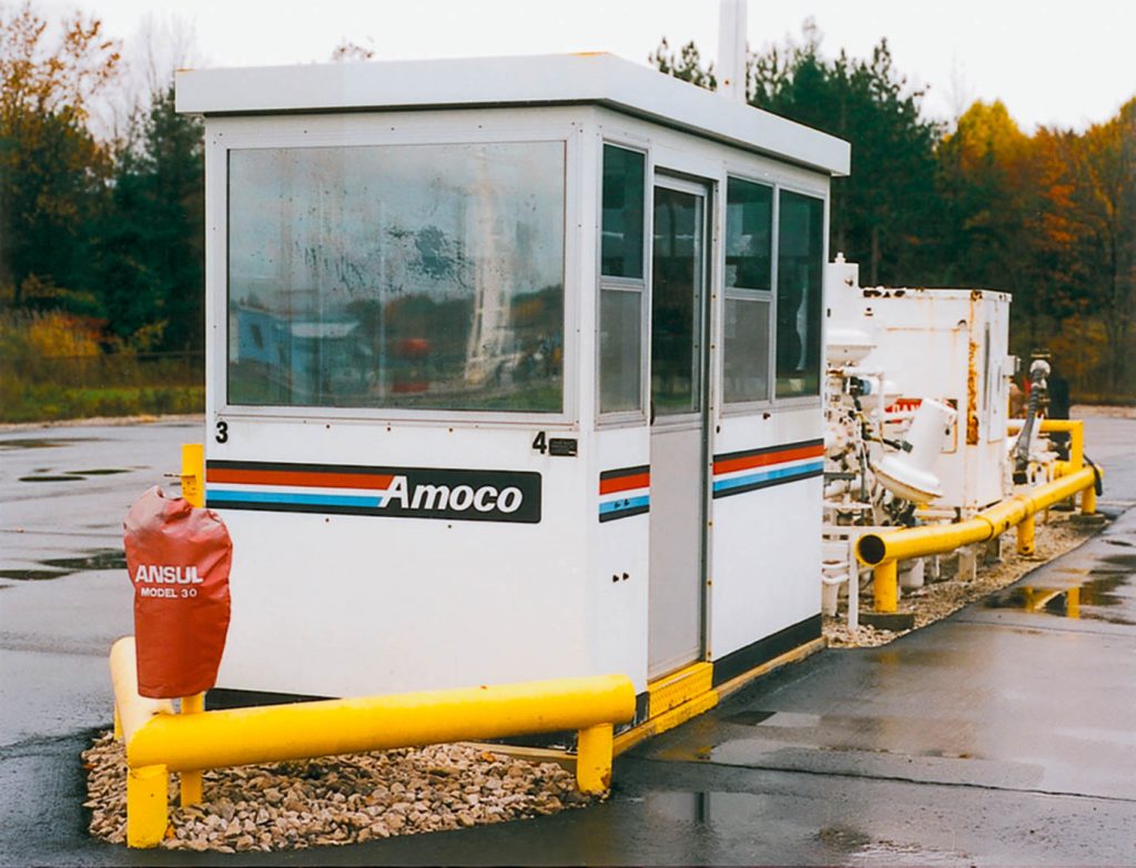 A Carbis Solutions guard shack at the entrance of a refinery.