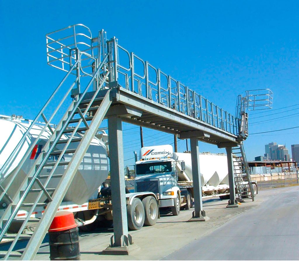 Swing gates on a loading platform in a cement making facility.