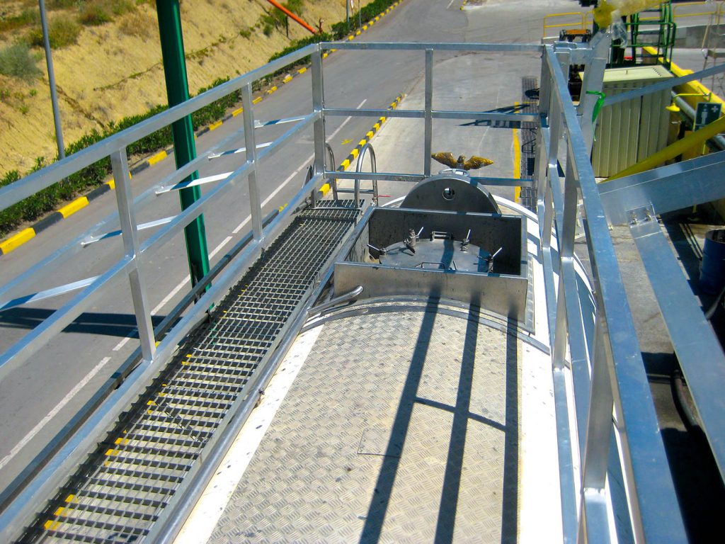 Looking down the catwalk of a truck enclosure.