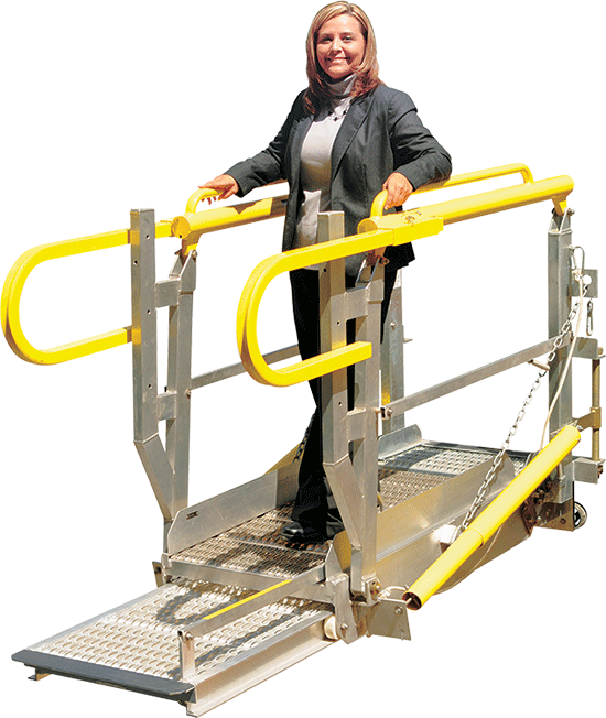 A woman stands on a telescoping ramp.